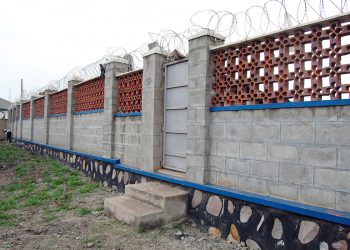 Wall-fence construction at Nakivubo Blue P/S